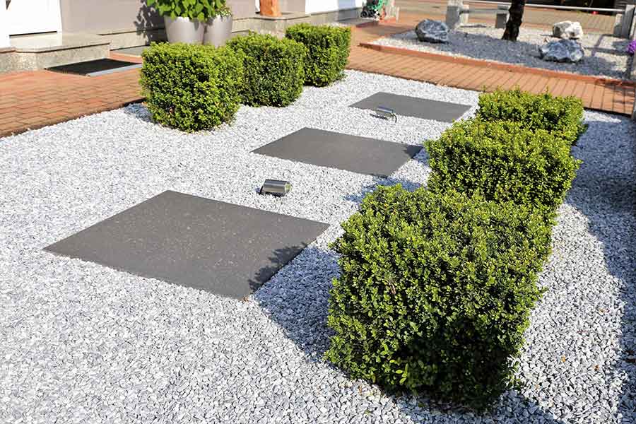 Decorative gravel used to soften hard landscaping and planting in a garden